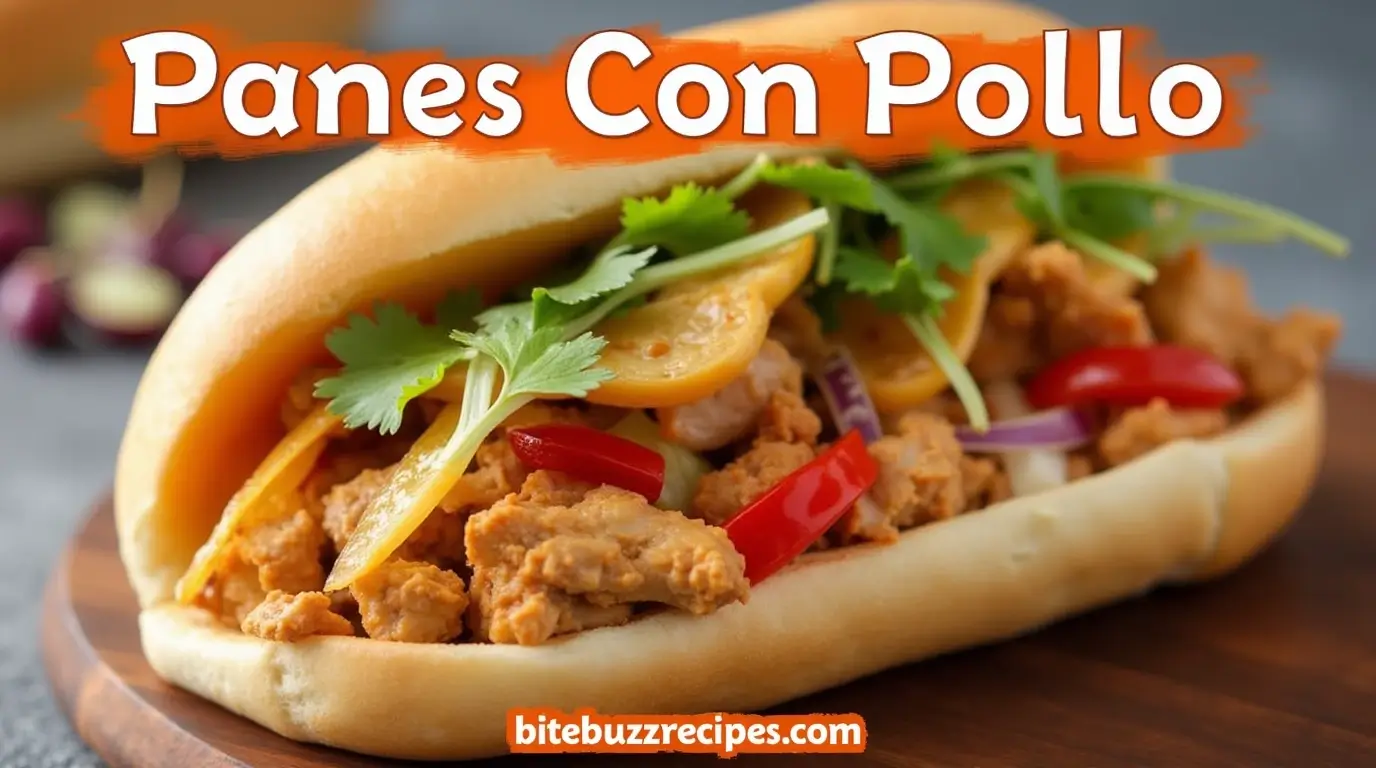 A delicious serving of Panes Con Pollo, featuring tender chicken, fresh vegetables, and a flavorful sauce, all nestled in a soft bread roll.